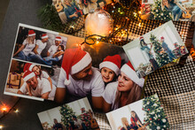 Photos Of Family Against Christmas Lights Decor Background