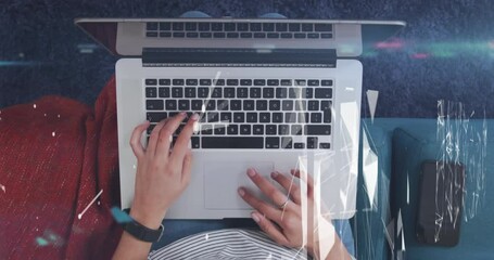 Poster - Animation of light and shapes over hands of caucasian woman using laptop