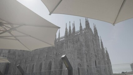 Sticker - Beautiful view of the Duomo Monument from a cafe in Milan, Italy.