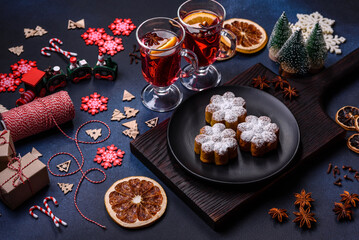 Hot mulled wine with a slice of orange, with cinnamon, cloves and other spices