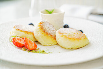 Canvas Print - cottage cheese pancakes with sour cream