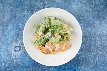 Wall Mural - caesar salad with grilled chicken