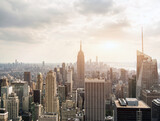 Fototapeta Miasta - New York skyscraper towers at sunset aerial view