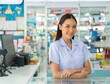 © CandyRetriever  - Portrait of Attractive Asian woman professional pharmacist ready for medication advice about medicine, drugs and supplements in modern drugstore. Medical pharmacy and healthcare providers concept.
