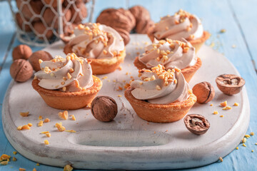 Wall Mural - Sweet mini tartlets made of crunchy ingredients.