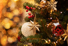 Decorated Christmas Tree On Blurred Background,magical Atmospheric Light
