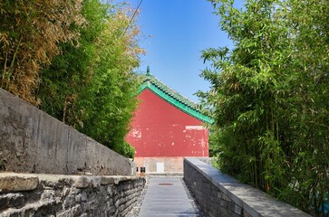 Canvas Print - Pathway to the historic red Pudu temple in Beijing