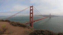 PAN SLOW MOTION SHOT - The Golden Gate Bridge from the Battery Spencer overlook in Sausalito, California, USA.