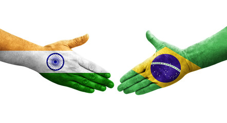 Handshake between Brazil and India flags painted on hands, isolated transparent image.