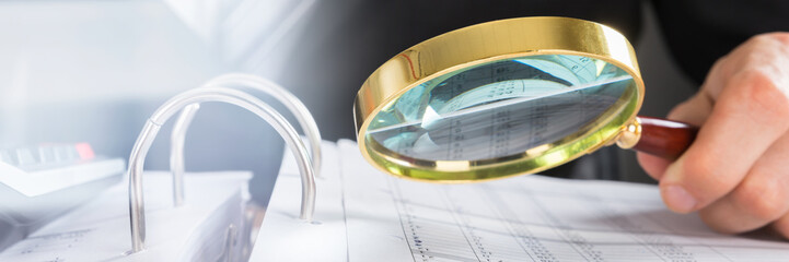 Poster - Businessman Examining Invoice With Magnifying Glass