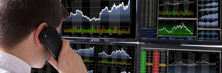 Poster - Close-up Of Stock Broker Talking On Telephone