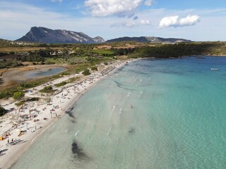 Sticker - Cala Brandinchi beach with its beautiful white sand, and turquoise water. Tavolara, Sardinia, Italy.