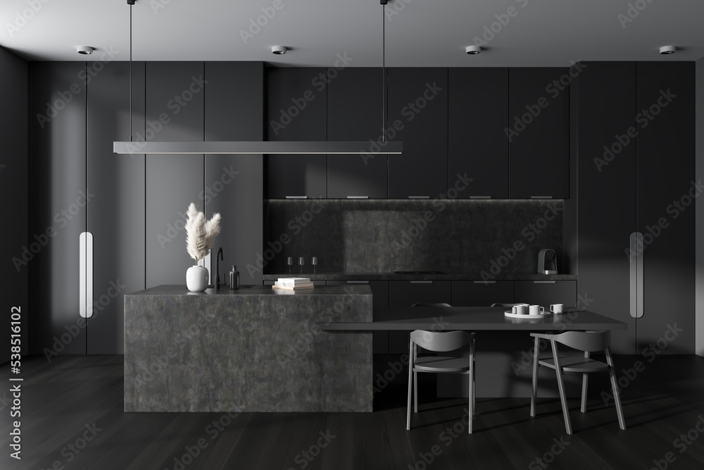 Grey kitchen interior with bar countertop and dining table Stock ...