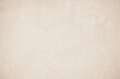 © Manitchaya - Old concrete wall texture background. Close up retro plain beige color cement material surface.