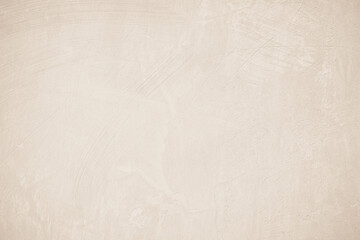 Old concrete wall texture background. Close up retro plain beige color cement material surface.