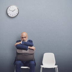 Wall Mural - Businessman sitting in the waiting room