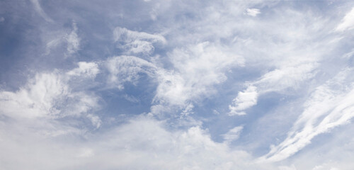 Cirrostratus clouds and cirrus clouds in the sky