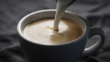 Fototapeta Mapy - pour steamed milk into white cup making cappuccino
