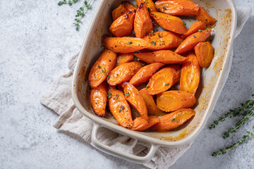 Wall Mural - Honey coasted and glazed roasted carrots. Tasty and delicious vegetable side dish.