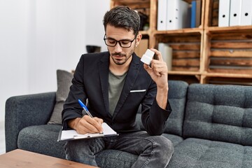 Sticker - Young hispanic man having psychology session prescribe pills at clinic