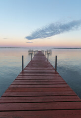  Dock on Mullett Lake in Indian River Michigan with pastel skies overhead