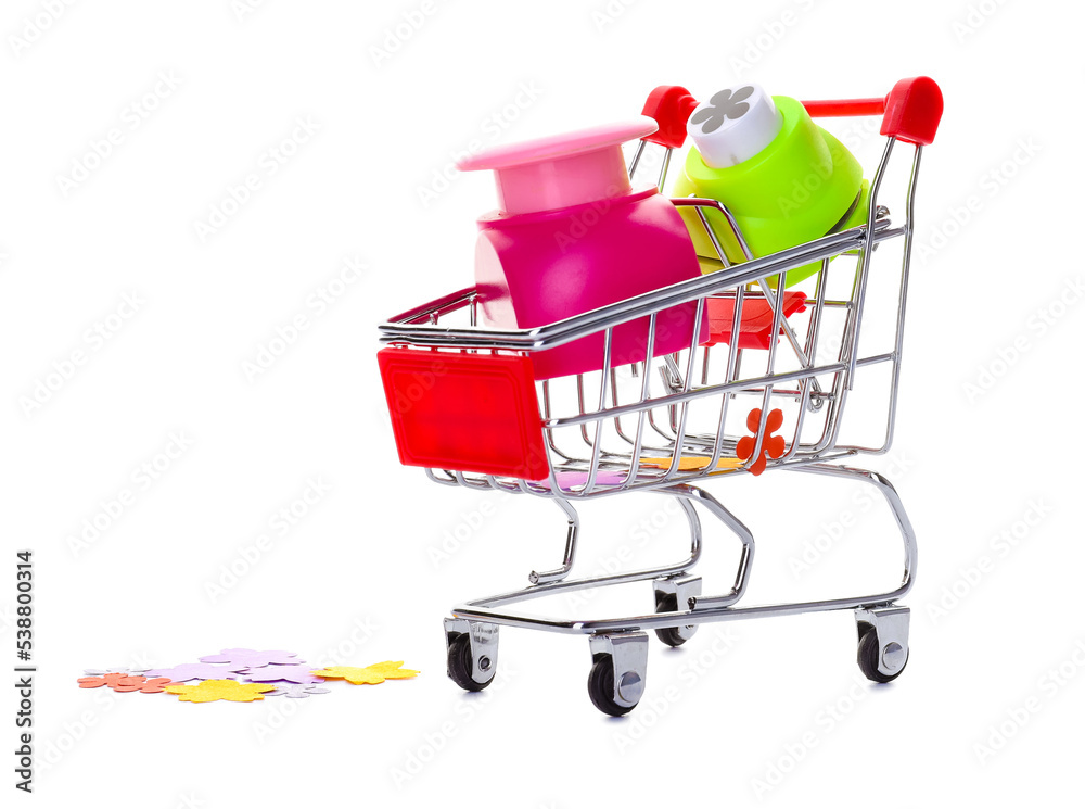 Shopping cart with curly hole punch on white background