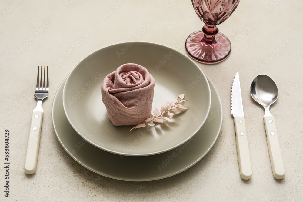 Simple dinnerware and beautiful decor on light table