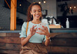 © Kay Abrahams/peopleimages.com - Restaurant, smartphone and relax black woman typing, scroll or check email, contact social media app or social network user. Happy, smile and young gen z girl with mobile tech post to online web blog