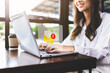 © chayantorn - email marketing and inbox concept. Businesswoman checking e-mail on laptop with email inbox icon illustration. company sending many e-mails or digital newsletter to customers