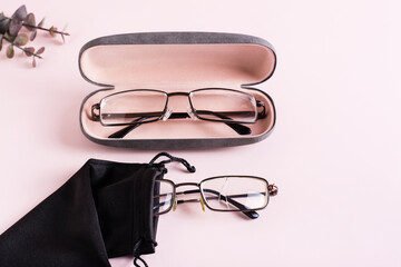 Wall Mural - Storage concept - broken glasses in a soft case and whole glasses in a hard case side by side