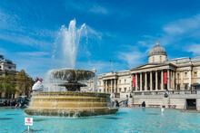 UK, England, London, Fountain On Trafalgar Square With National Gallery In Background