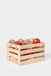 © Westend61 - Wooden box full of colorful christmas baubles against white background