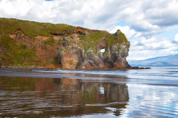 Wall Mural - Mirror beach and rocks in Kasatka Bay, Iturup Island, South Kuril Islands