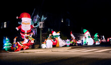 Christmas Inflatable Street Decorations At Night. Christmas And New Year Background.