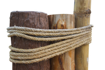 Wall Mural - Rope with knot wrapped around a brown wooden post. isolated on white background.