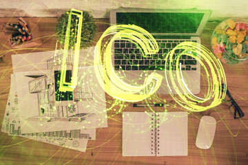 Poster - Blockchain theme hologram drawings over computer on the desktop background. Top view. Double exposure.