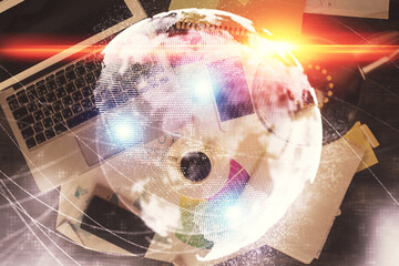 Poster - Business theme hologram drawings over computer on the desktop background. Top view. Multi exposure. Concept of international connections.