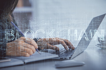 Poster - Double exposure of woman hands typing on computer and crypto market theme hologram drawing. Blockchain concept.