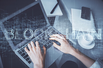 Poster - Double exposure of woman hands typing on computer and crypto market theme hologram drawing. Blockchain concept.