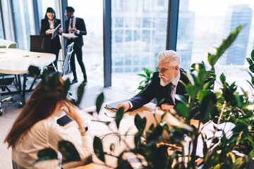 Wall Mural - Serious businesspeople working in office