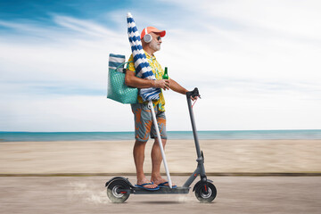 Wall Mural - Senior tourist riding an electric scooter