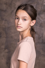 Wall Mural - Studio portrait of a young teen girl