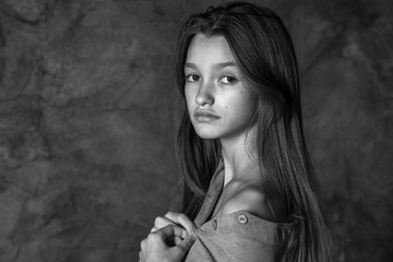 Wall Mural - Studio portrait of a young teen girl