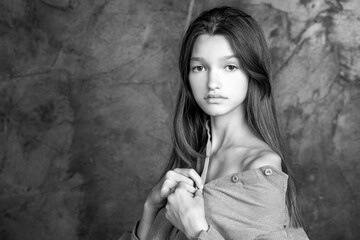 Wall Mural - Studio portrait of a young teen girl