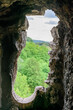A window in the stone wall of the Ogrodzieniec Castle.