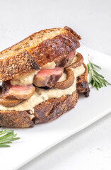 Wall Mural - Sandwich with beef steak and mushrooms