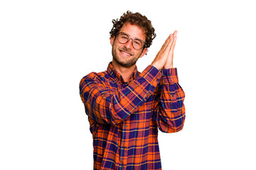 Wall Mural - Young caucasian curly hair man isolated Young caucasian man with curly hair isolated feeling energetic and comfortable, rubbing hands confident.