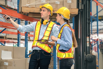 Wall Mural - Caucasian man, woman warehouse supervisor discuss and use tablet check package with forklift driver worker load box on shelf, product distribution inventory management,Logistics shipping business plan