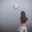 Young woman checking the time