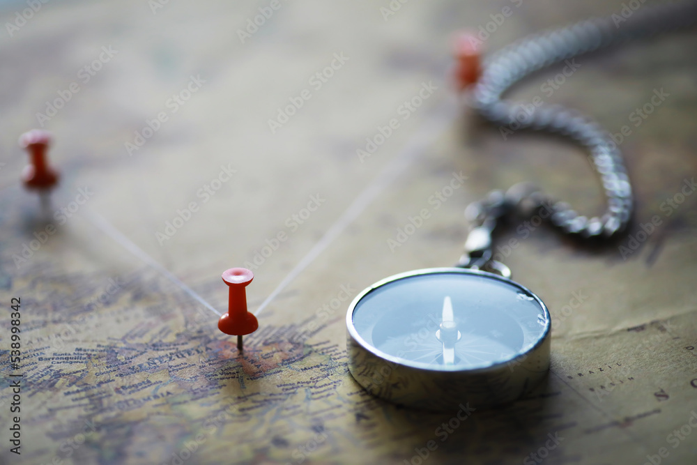 Travel concept. Map and needle with a marked place. Compass point on ...